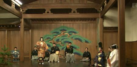 Noh player and accompaniment